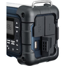 blauw Zijaanzicht van een blauwe Blackout-radio met AUX-aansluiting.