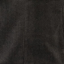 zwart/grijs Houndstooth patroon op een fluwelen blazer stof