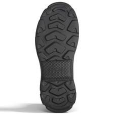 zwart Onderzijde van een zwarte Tretorn neopreen Chelsea-boot met profiel.