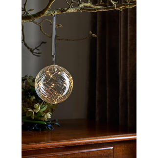 Glazen bal met micro-leds Een fijne magische licht, gevangen in getint glas.