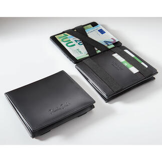 Magic wallet De betere (en mooiere) portemonnee: extra dun, extra veilig, met speciale bankbiljetfunctie.