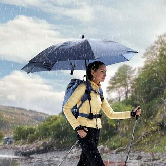 Handsfree trekkingparaplu Zelfs als u de paraplu draagt, heeft u beide handen vrij. En ook de rugzak blijft droog.