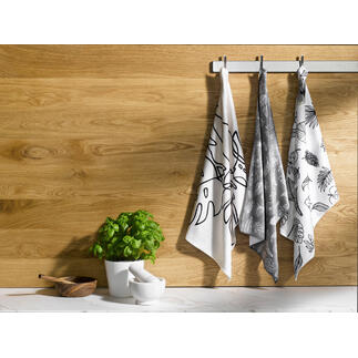 Drie Speed-Dry vaatdoeken hangen aan een houten stang.