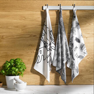 Drie Speed-Dry vaatdoeken hangen aan een houten stang.