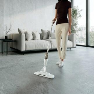 3-in-1 Spray-mop wordt gebruikt door een vrouw, de vloer is leeg