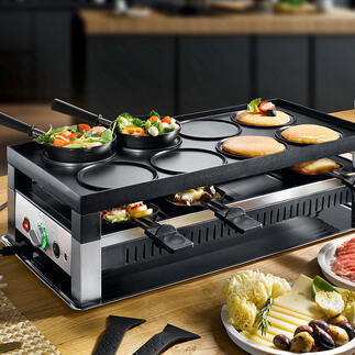 Solis raclette- en fun-koken 5-in-1 apparaat met groenten en vlees op de tafel.
