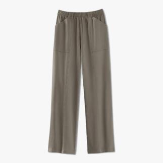 Grijze, wijde broek met twee voorkw pockets op een witte achtergrond