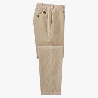 Beige corduroy broeken, opgevouwen, goed zichtbaar.