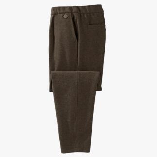 Heren Softwalk-broek in donkerbruin, op een tafel gelegd.