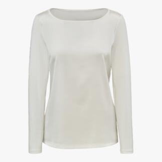 Crèmekleurige zijden jersey blouse met ronde hals en lange mouwen aan de voorkant.