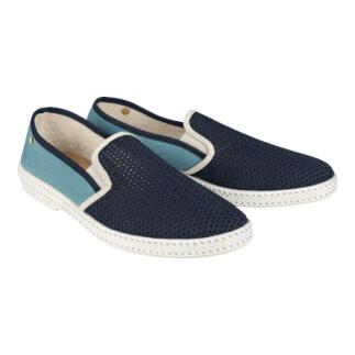 Donkerblauwe Rivieras-zomerslippers met aqua kleurige zijkant, twee paar.