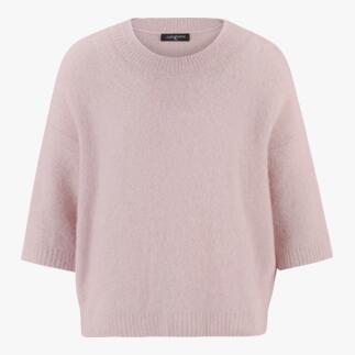 Een zachte, roze, kortärmige trui van Junghans, minimalistisch ontwerp.