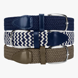 Drie elastische riemen in blauw, beige en marine met verschillende metalen gespen