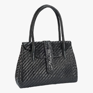 Allan K gevlochten leren tote bag in zwart, staand.
