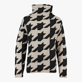Houndstooth kasjmier pullover in zwart en wit, van voren gefotografeerd.