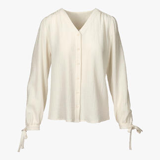 Lichte katoen-kasjmier blouse met lange mouwen en strikbanden.
