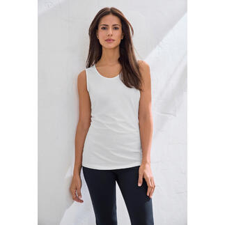 Wit basis-top van Swiss Cotton voor een lichte muur.