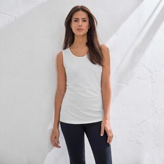 Wit basis-top van Swiss Cotton voor een lichte muur.
