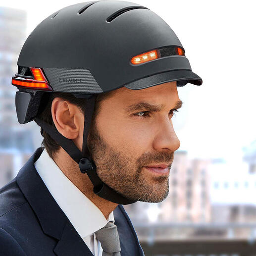 Zijaanzicht van een Livall BH51M slimme helm met LED-verlichting.