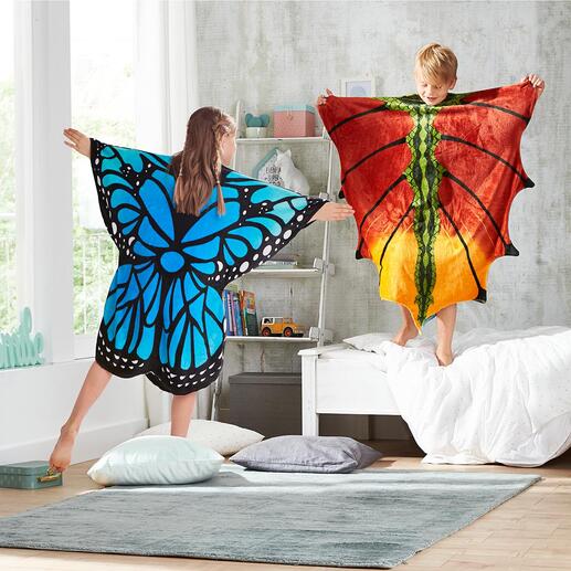 Poncho met print Een mooie vlinder of draak worden is kinderspel – heerlijk warm worden ook.