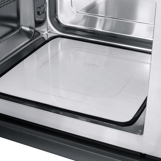 De platte keramische reflecterende bodem verdeelt de microgolven gelijkmatig in de gaarruimte van 25 l en is ruimtebesparend. De platte keramische reflecterende bodem verdeelt de microgolven gelijkmatig in de gaarruimte van 25 l en is ruimtebesparend.