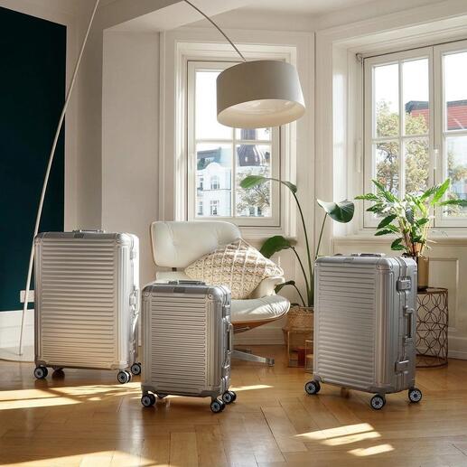 Drie aluminium trolleys NEXT in een kamer