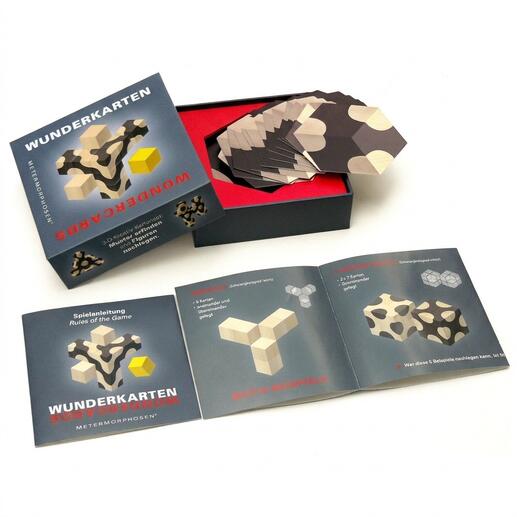 Wunderkarten spellen doos en kaarten met spelinstructies.