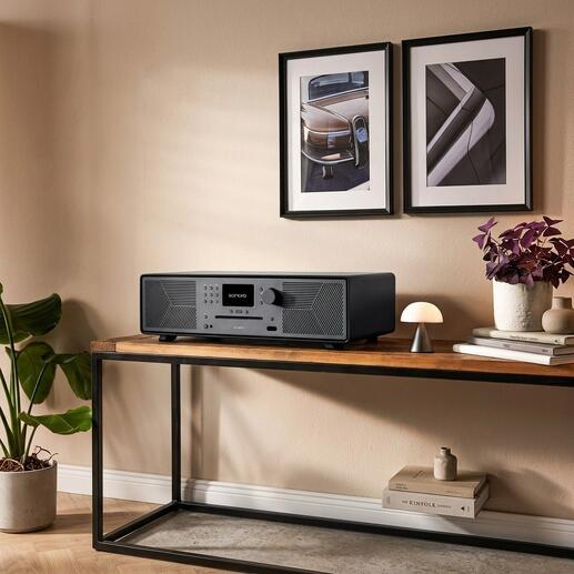 Zwarte MEISTERSTÜCK Gen.2 multi-radio op een houten plank.