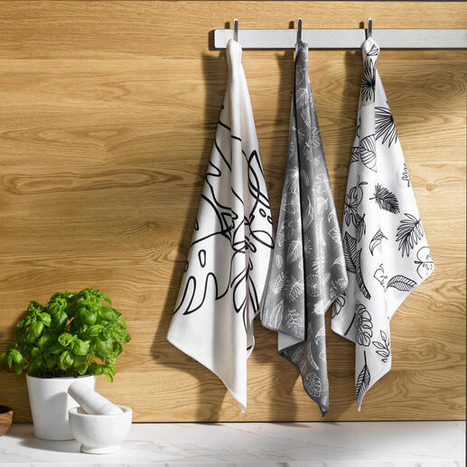 Drie Speed-Dry vaatdoeken hangen aan een houten stang.