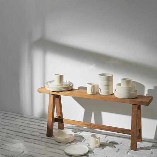 Reglaze Essteller 6-delige set decoratief gestapeld op een houten tafel.