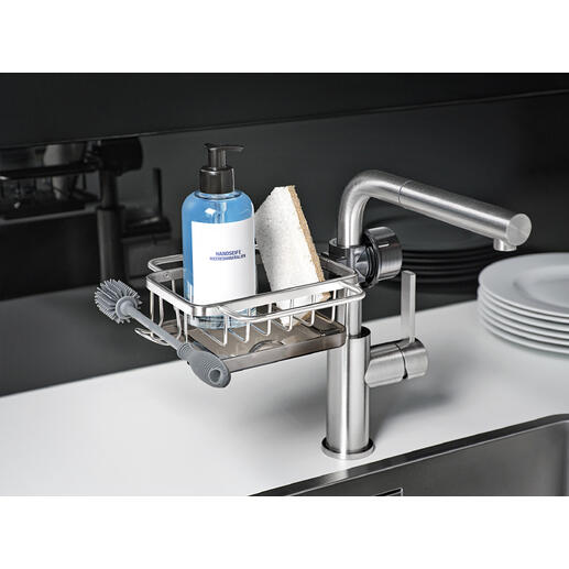 Spoelbak-organizer met fles en spons op de gootsteen.