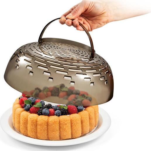Hand heft een afneembare deksel van een 3-in-1 schaal met fruit