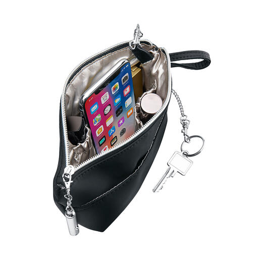 Met een Bag’nBag pakt u al uw bezittingen in één keer om naar uw handtas.