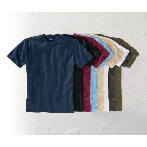 Verschillende kleuren van het 155 g-Ragman T-shirt op een tafel.