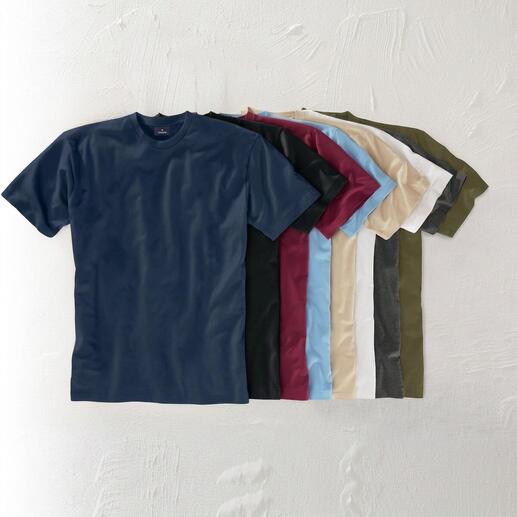 Verschillende kleuren van het 155 g-Ragman T-shirt op een tafel.