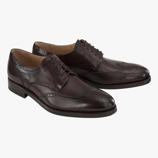 Twee bruine Cordwainer business schoenen met perforaties, vooraanzicht.