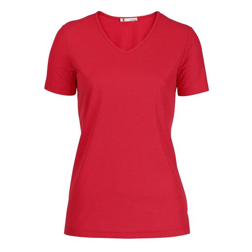 Rood V-shirt voor dames, eenvoudig gepresenteerd op een tafel.