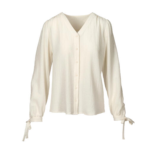 Lichte katoen-kasjmier blouse met lange mouwen en strikbanden.