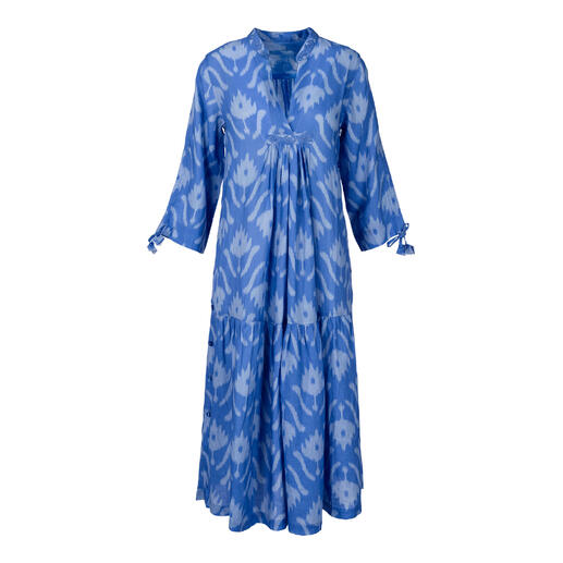 Lang kaftan jurk in blauwe kleur met bloemmotief.