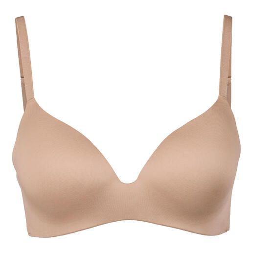 Karamelkleurige seamless soft BH op een witte achtergrond.