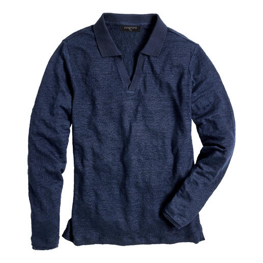 Blauwe langarmshirt ligt plat op een oppervlak.