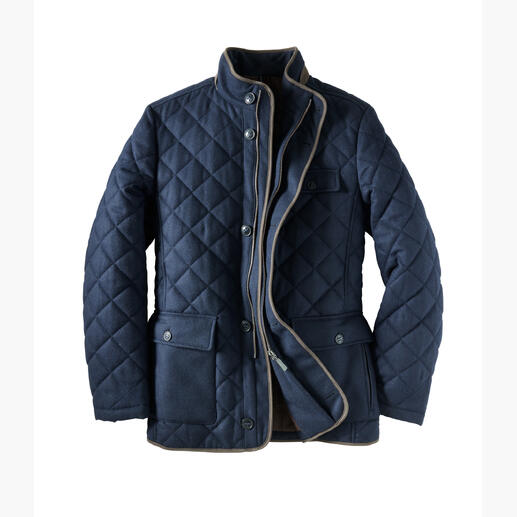Blau gewatteerde jas met zakken en rits.