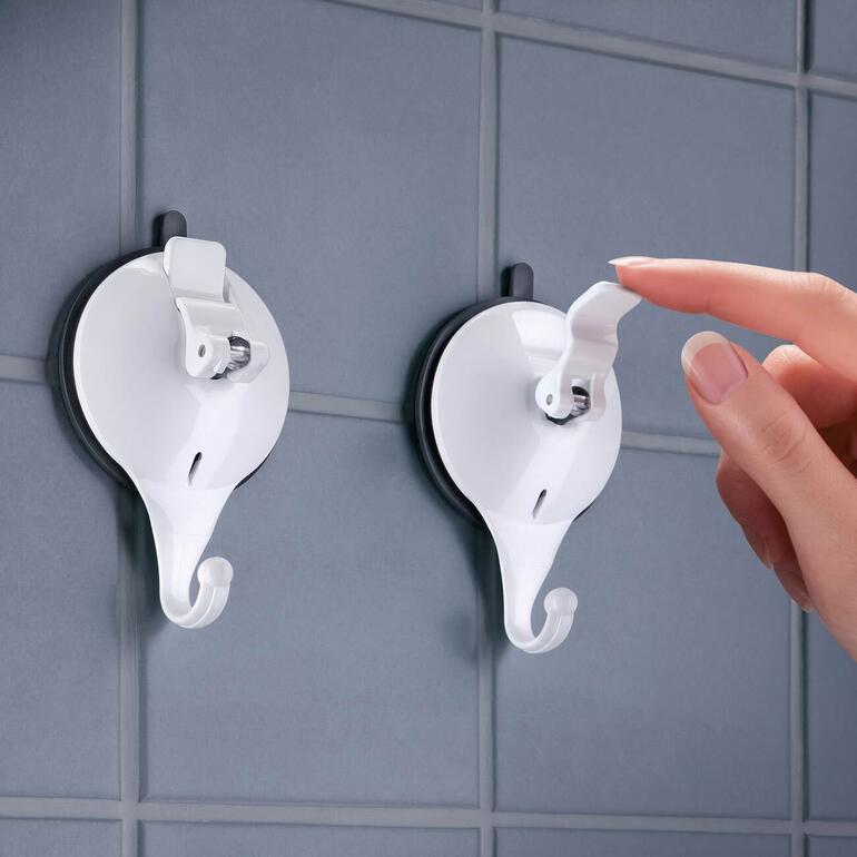 Geschikt voor alle gladde en licht gestructureerde oppervlakken (echter niet voor gepleisterde muren of muren met behang). Vacuumhaak 'Supergrip', praktisch voor het ophangen van handdoeken in de douche.