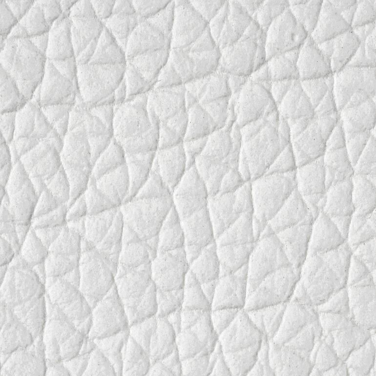 Design-kruk Close-up van het gestructureerde oppervlak van een lichte kruk.