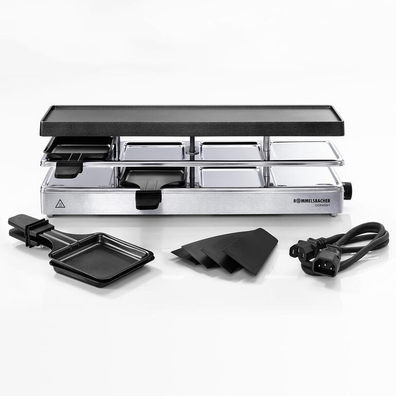 Raclette met spullen voor bereiding.
