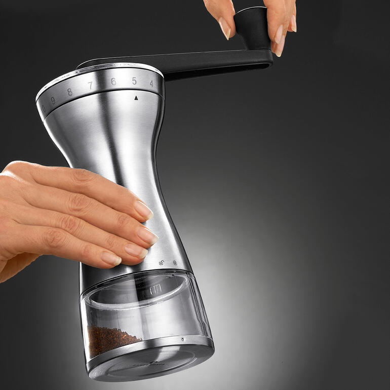 Handmatige koffiegrinder met instelbare stappen voor het malen van koffie.