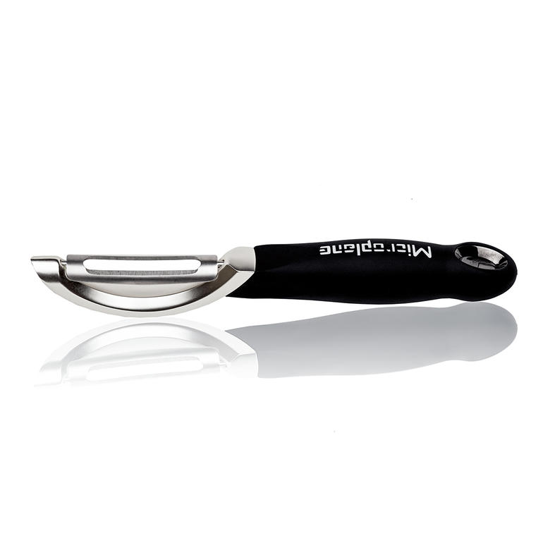 Microplane® professionele dunschiller Microplane® professionele dunschiller op een witte achtergrond.