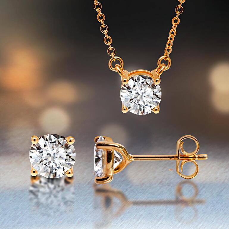 Moissanite sieraad: oorbellen en hanger in goudkleur