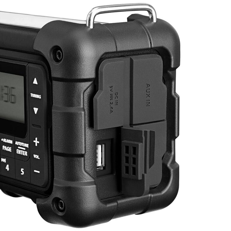 Achteraanzicht van een digitaal survivalradio met USB- en AUX-aansluiting.