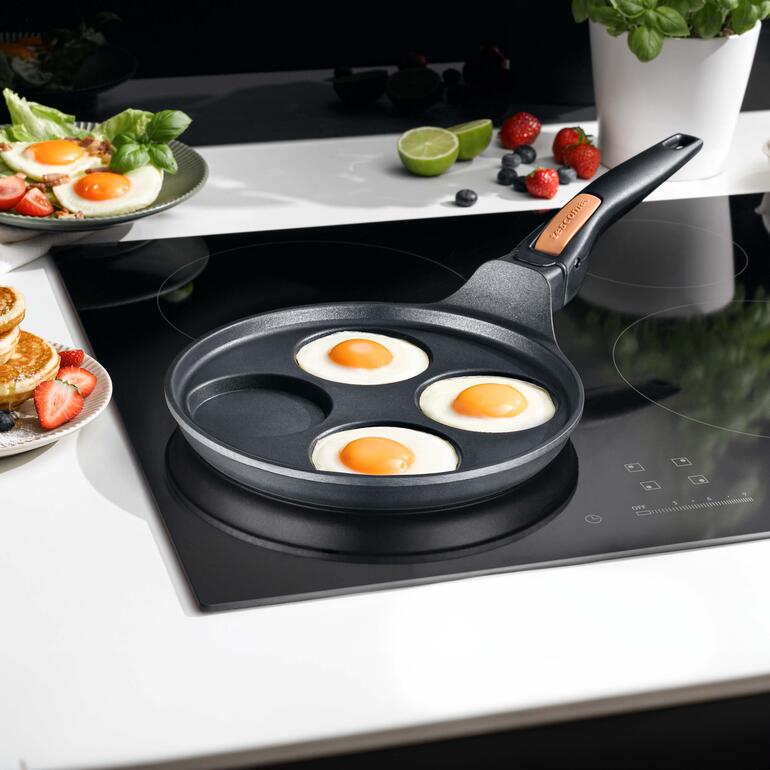 Pannetje met vier uitsparingen op het fornuis